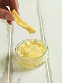 Dipping a crisp in aioli