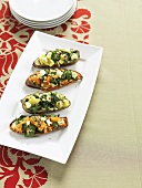 Sweet potatoes stuffed with feta and blue cheese