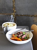 Moroccan lamb fillet with carrots on couscous