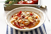 Tripe soup with beans and carrots