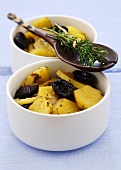 Potatoes with prunes and thyme