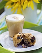 Blueberry muffin and milky coffee