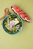 Salad with feta and onions, watermelon