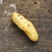 A potato on a wooden background