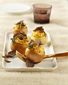 Onions with polenta stuffing and black truffles