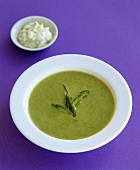 Cream of asparagus soup and crème fraîche with parsley
