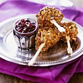 Chicken with nut crust and cranberry dip