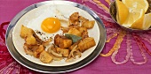 Indian fried potatoes with fried egg