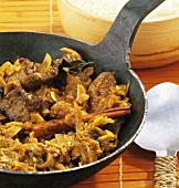 Stir-fried beef with coconut