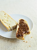 Sugared evaporated milk and milk jam on bread (France)