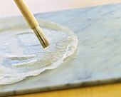 Brushing brick pastry with oil