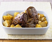 Roast suckling lamb with potatoes