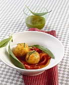 Crispy sheep's cheese dumplings with ramsons on marinated peppers