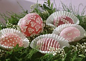 Decorated Easter eggs in paper cases