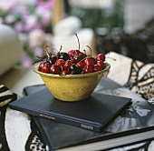 A bowl with sweet cherries