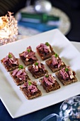 Canapes with duck and onion chutney