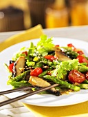 Portobello mushrooms with asparagus and cherry tomatoes