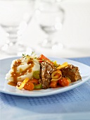 Braised pork with vegetables and mashed potatoes