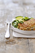 Sea bass with a muesli crust and courgette strips