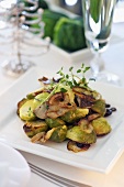 Roasted Brussels sprouts with mushrooms and onions