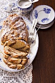 Hefe-Nusszopf (sweet yeast bread with nuts) with icing sugar