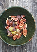 Chopped figs in a ceramic bowl