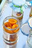 Pitted apricots in a jar