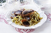 Fried herring on a bed of white cabbage for Christmas dinner