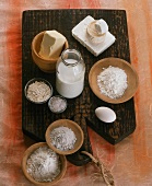 An arrangement of flour, milk, rice, cheese, eggs, sugar and butter