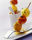 Marinated melon skewers