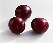 Three plums (variety: Redsweet)