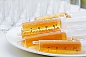 Syringes containing jelly (molecular gastronomy)
