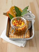 Home-made pumpkin chutney in a preserving jar