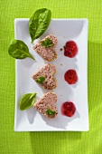 Heart-shaped appetisers made with luncheon meat