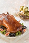 Roast duck with figs and grapes for Christmas