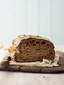 Rustic coarse rye bread, slices removed