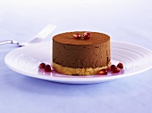 Chocolate mousse cake with pomegranate seeds