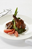 Roast duck with pink grapefruit and spring onions