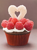 Chocolate cupcake with raspberries for Valentine's Day