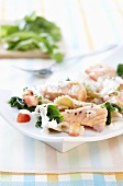 Salmon fillet with spinach and farfalle