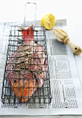 Red Roman in grill basket on newspaper