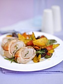 Bacon-wrapped pork fillet with vegetables
