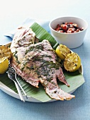 Grilled fish with lemons and salsa