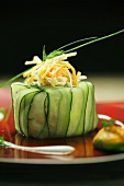 Celery, pumpkin and apple salad wrapped in cucumber