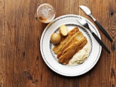 Fried herring fillets with creamed onions & boiled potatoes