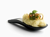 Lemon mashed potatoes with deep-fried onion & parsley topping