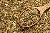 Dried golden rod leaves with wooden spoon