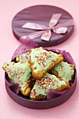 Sweet peanut butter turnovers with coloured icing