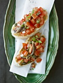 Tomato bruschetta with anchovies and capers