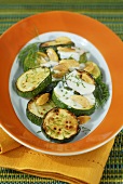 Fried courgettes with almonds and dill sauce
